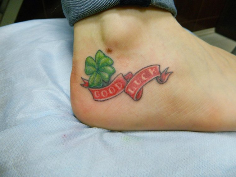 Татуировки приносящие удачу и богатство для девушек (49 фото) 36 Символ удачи тату